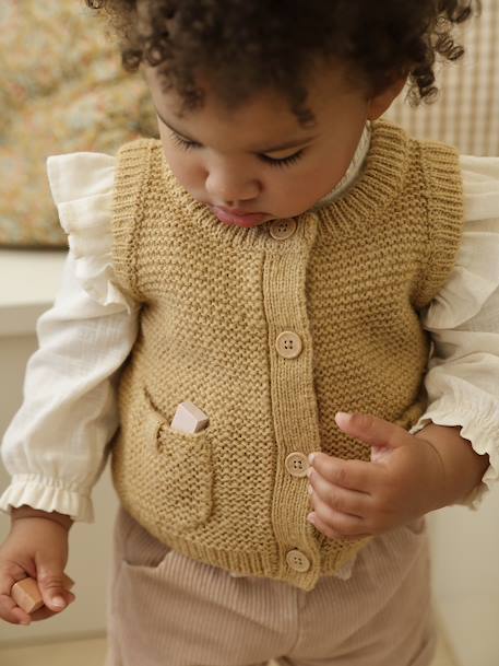 Buttoned sleeveless baby cardigan ochre 